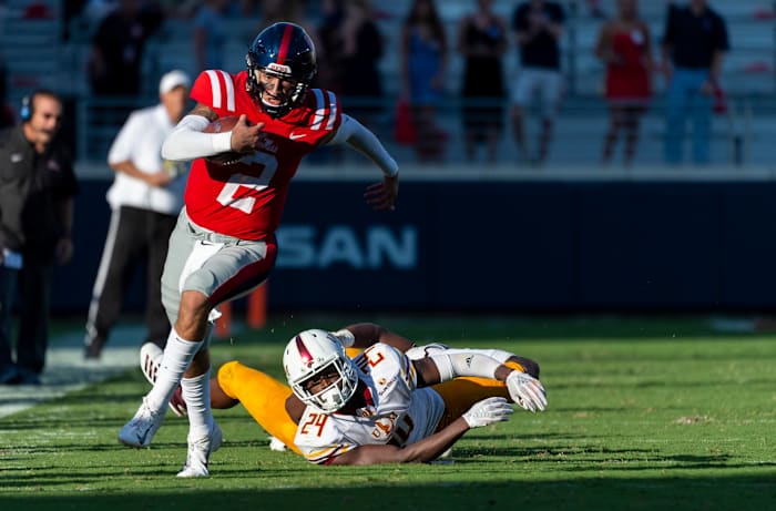 Oct 6, 2018; Oxford, MS, USA; Louisiana Monroe Warhawks defensive back Jabari Johnson (24) can only watch after Mississippi Rebels quarterback Matt Corral (2) escapes his grasp and runs for a 61-yard touchdown during the second half at Vaught-Hemingway Stadium. Mandatory Credit: Vasha Hunt-USA TODAY Sports